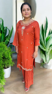 Burnt orange chanderi silk kurti with mirror work and comes gharara and dupatta