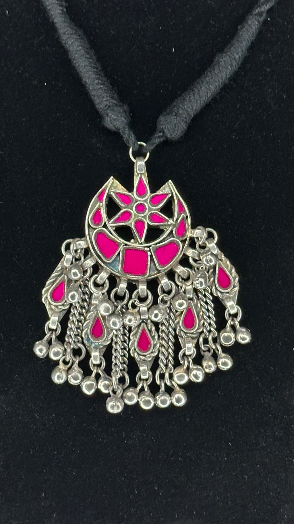 Indian Pink glass pendent with black thread