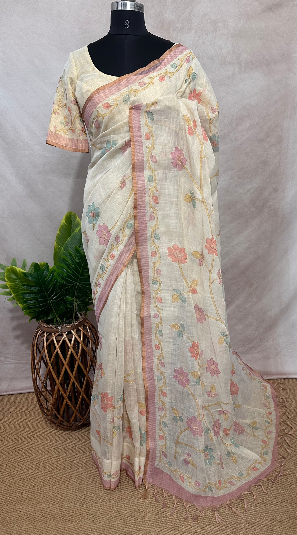 Printed Tissue linen saree with thread work, and stitched blouse