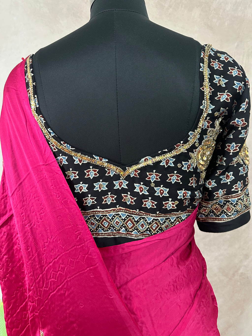 Modal silk saree with bead and mirror work , stitched blouse
