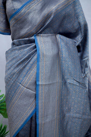Blue brocade organza saree with stitched blouse