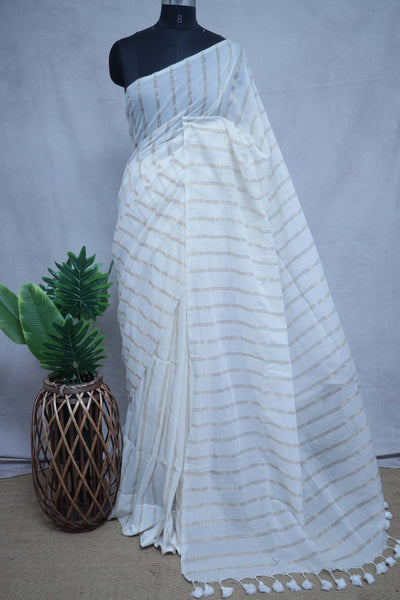 Off white cotton saree with gold stripe