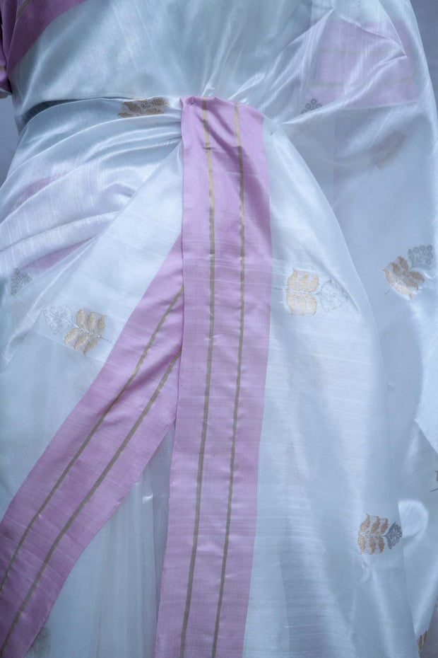 While katan chanderi pure silk saree with pink border, stitched blouse