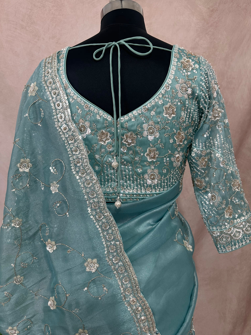 Blue tissue designer saree with stitched blouse and under skirt