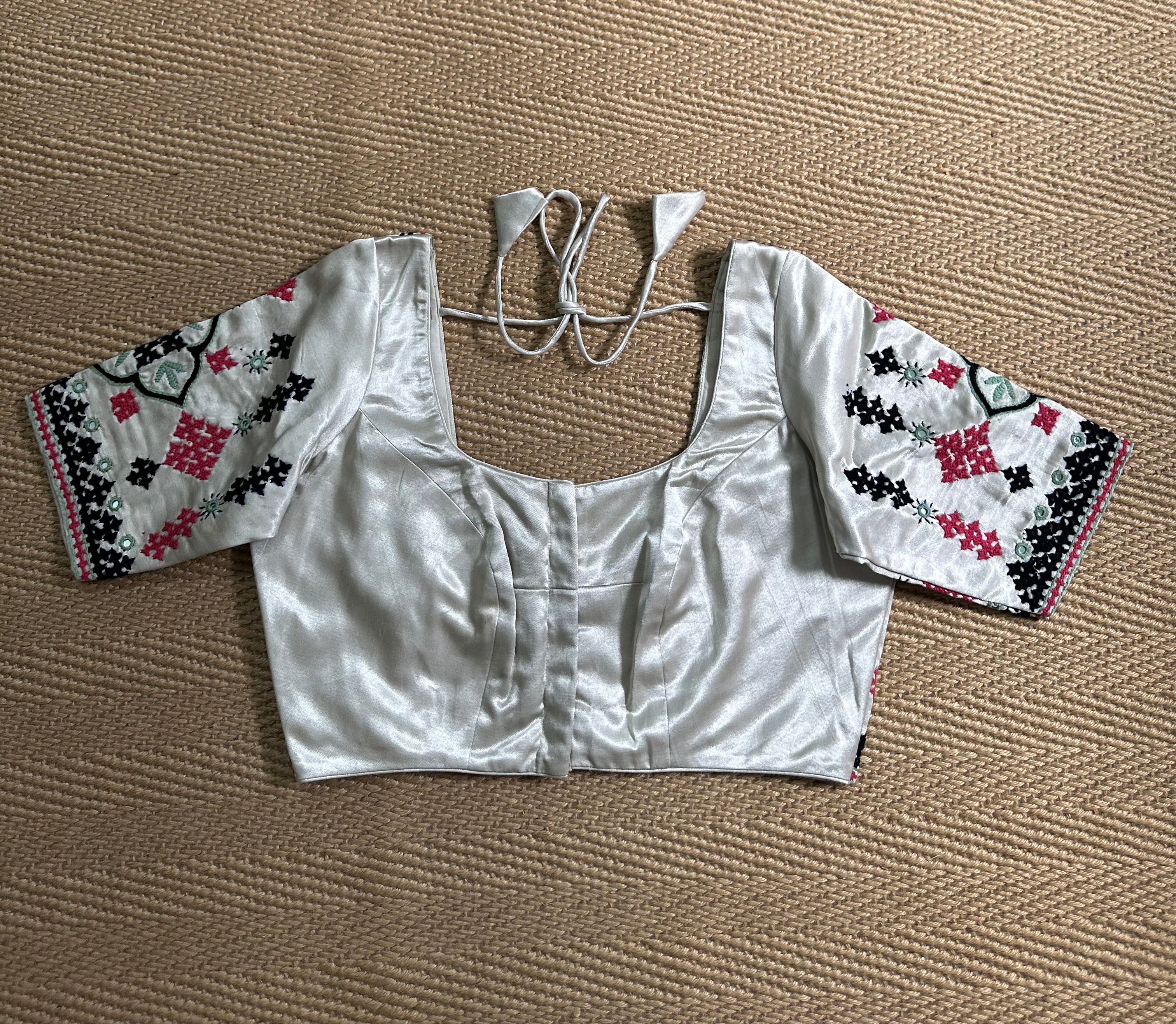 Light grey modal silk blouse with mirror work and hand Kutch Embroidery
