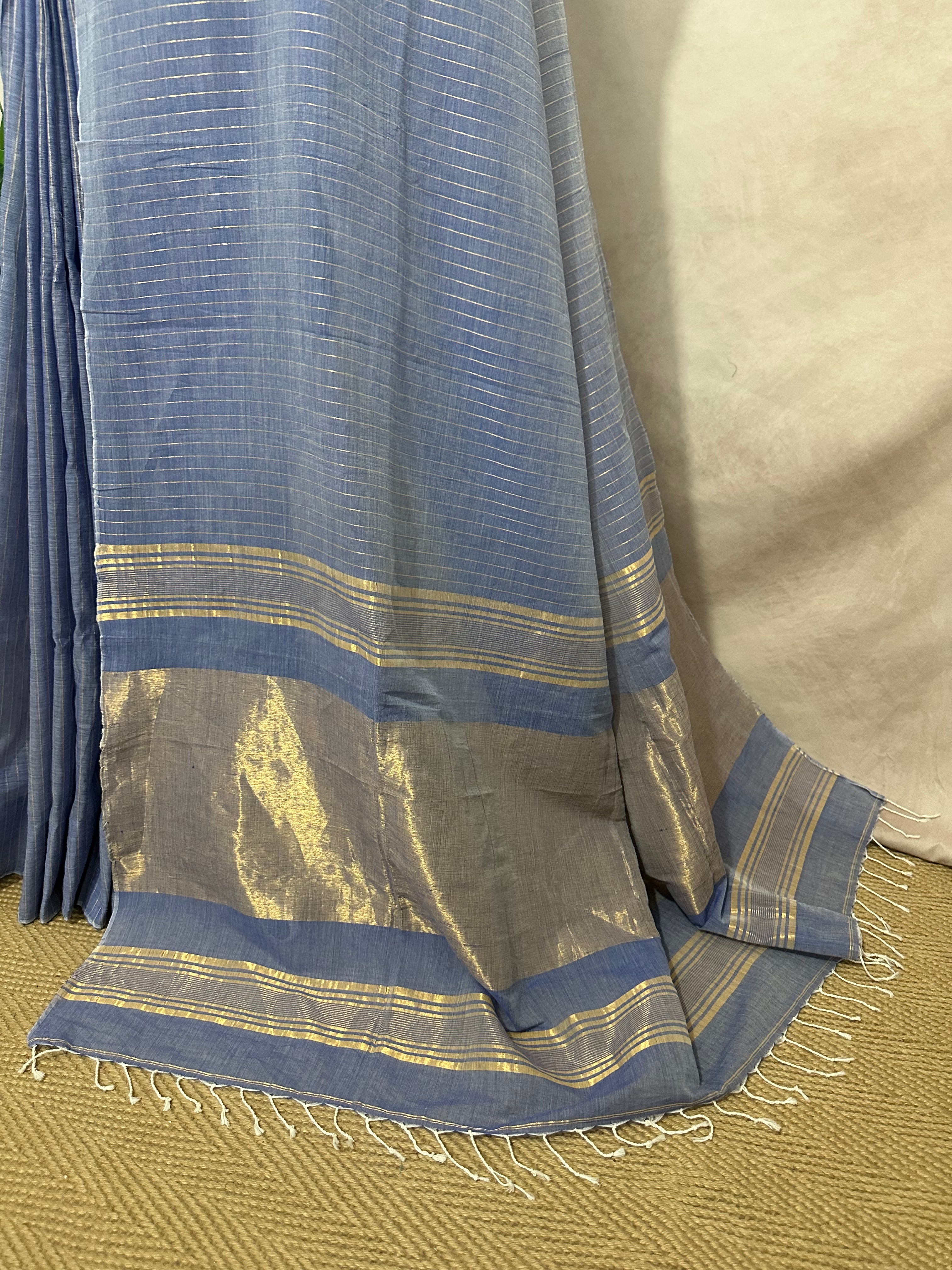 Handloom Light blue cotton saree with gold line, with stitched blouse