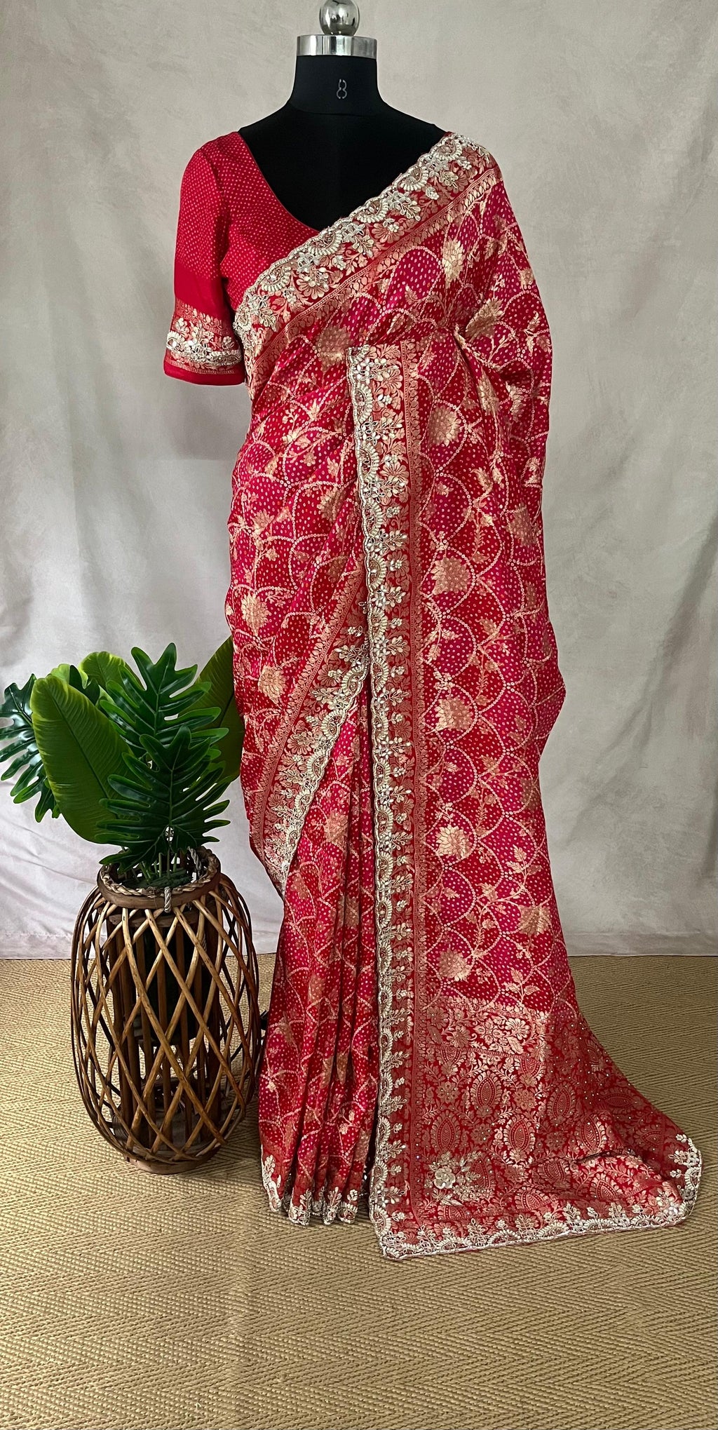 Red and pink combo designer saree with embroidery work and stitched blouse