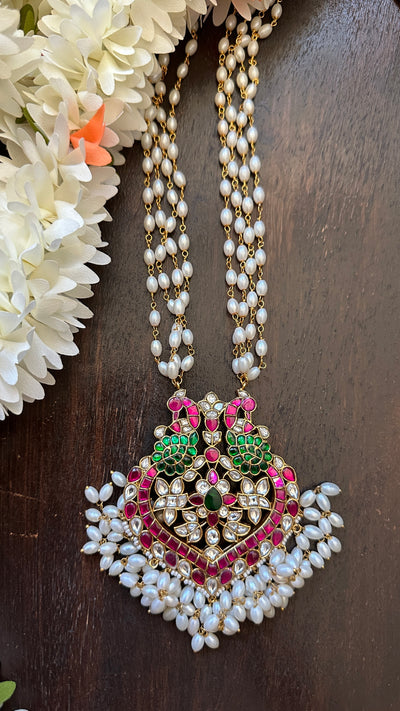 Jadau kundan, ruby red and green kemp stone pendent with 4 line pearl chain