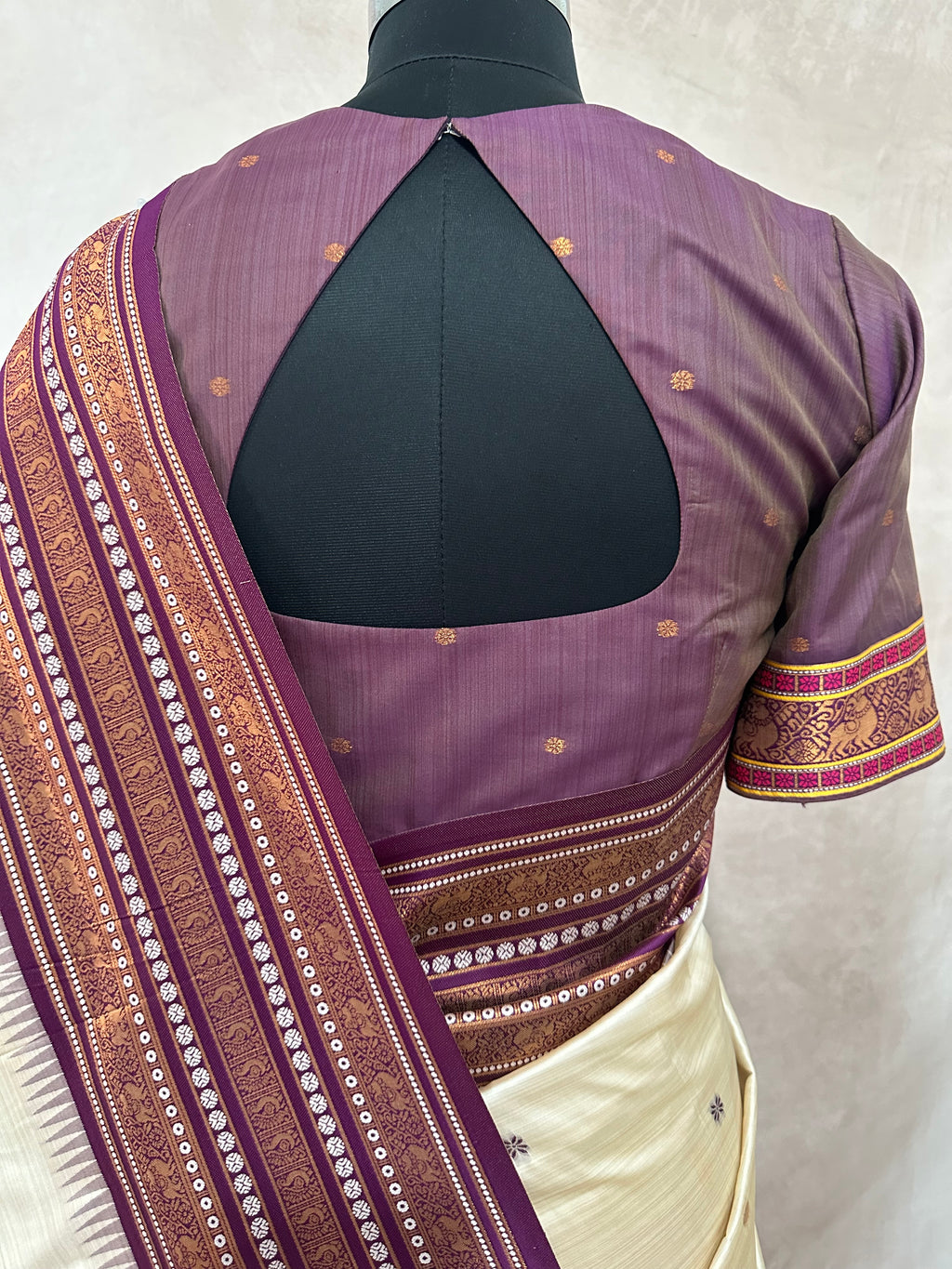 Asam silk saree with Purple broder and stitched blouse