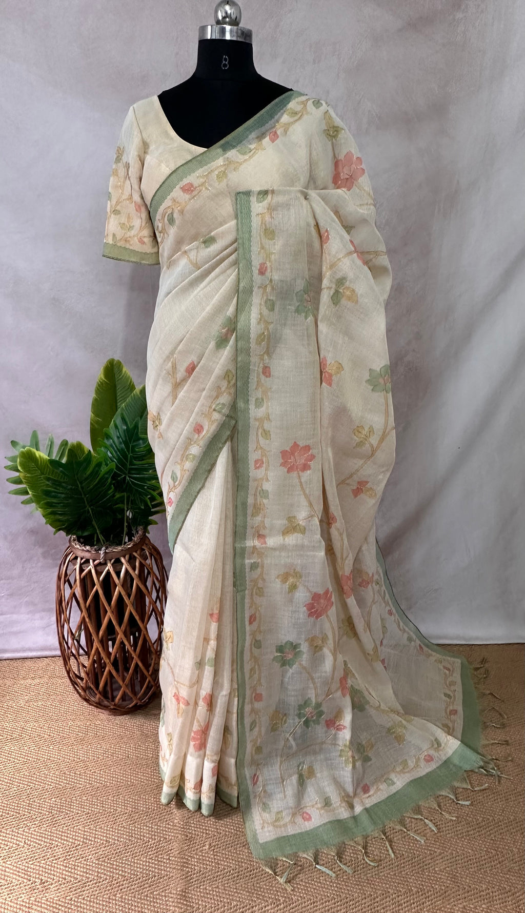 Printed Tissue linen saree with thread work, and stitched blouse