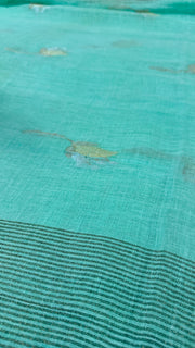 Light pista green color Linen saree with gold and silver tulip weave, with stitched