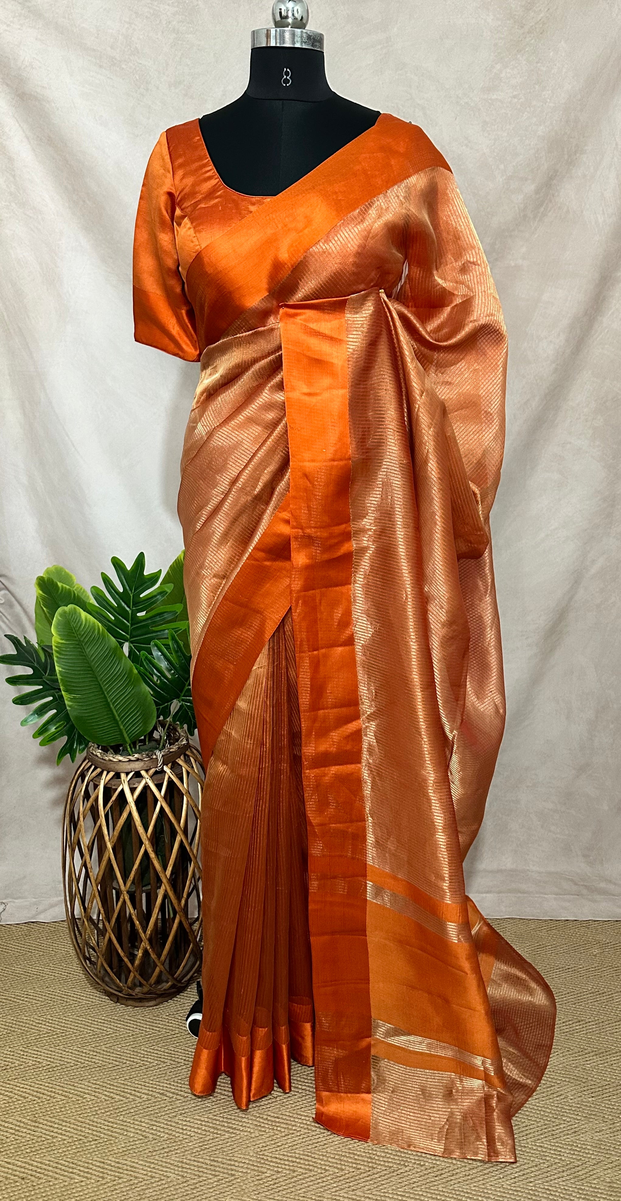 Orange stripe tissue silk saree with stitched blouse