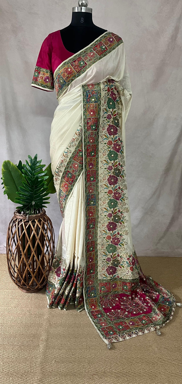 Cream munga silk saree with floral weaved border and bead work, comes with stitched blouse