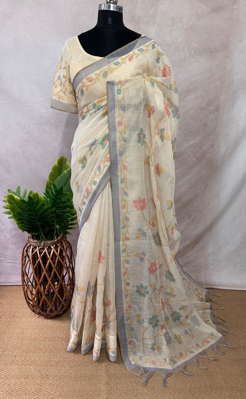 Printed Tissue linen saree with thread work, and stitched blouse