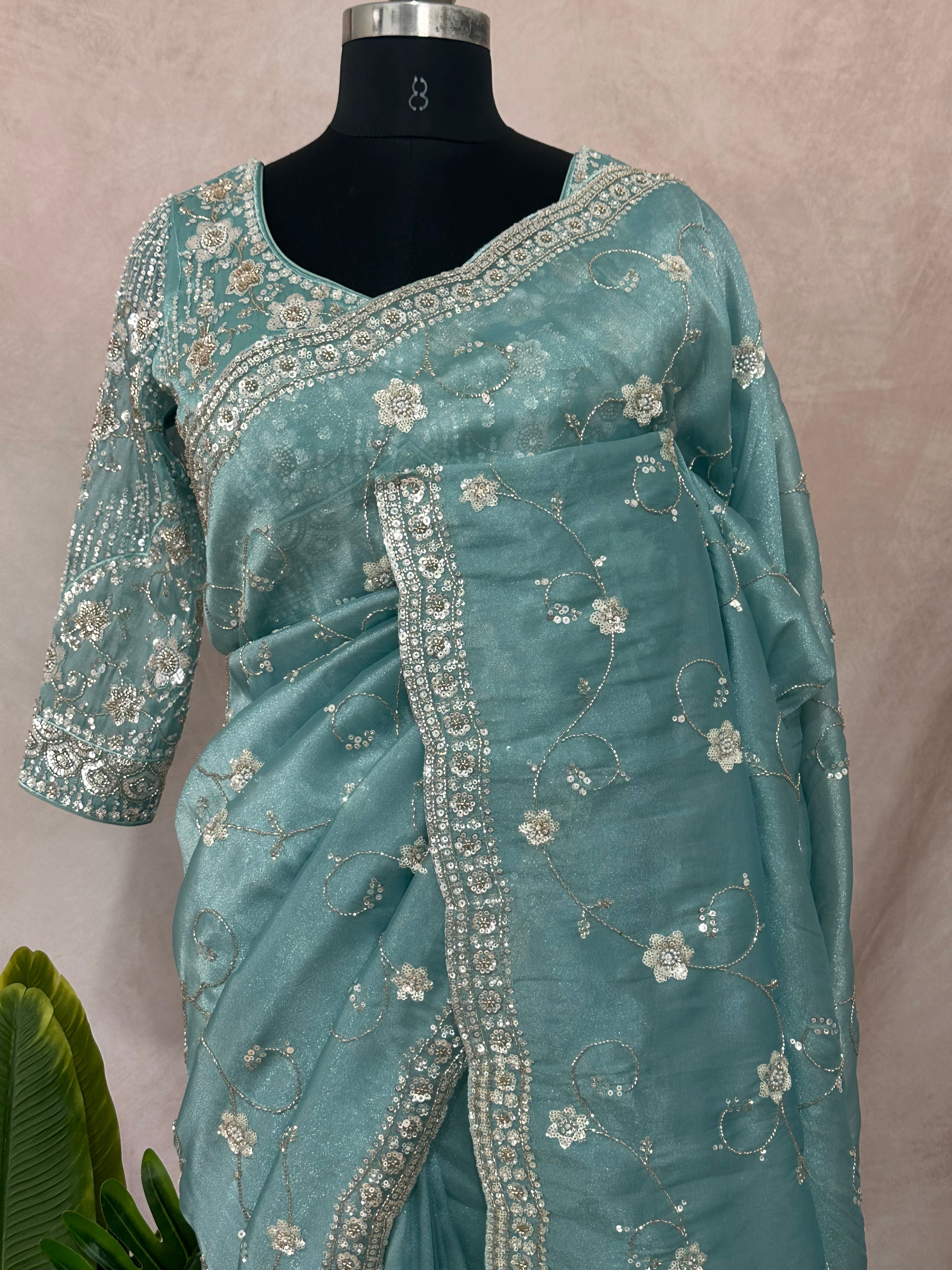 Blue tissue designer saree with stitched blouse and under skirt