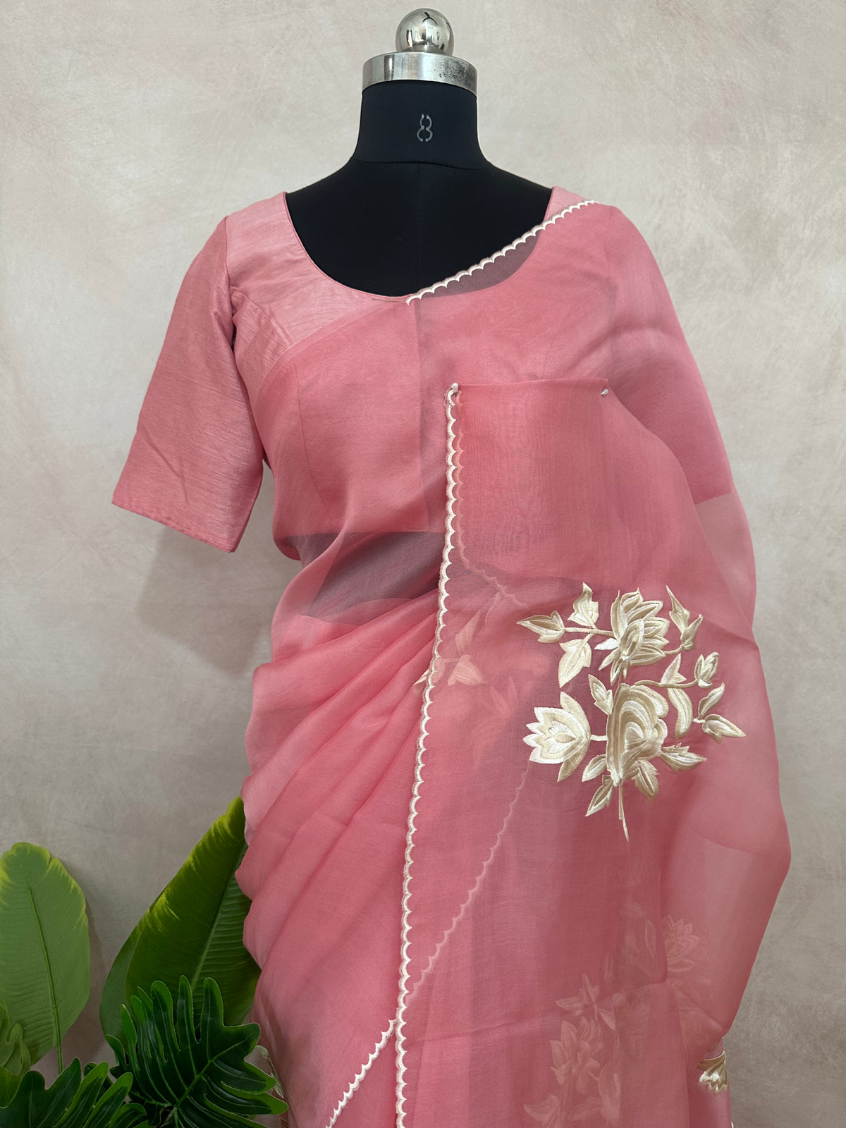 Dusty pink organza saree with thred embroidery and stitched blouse