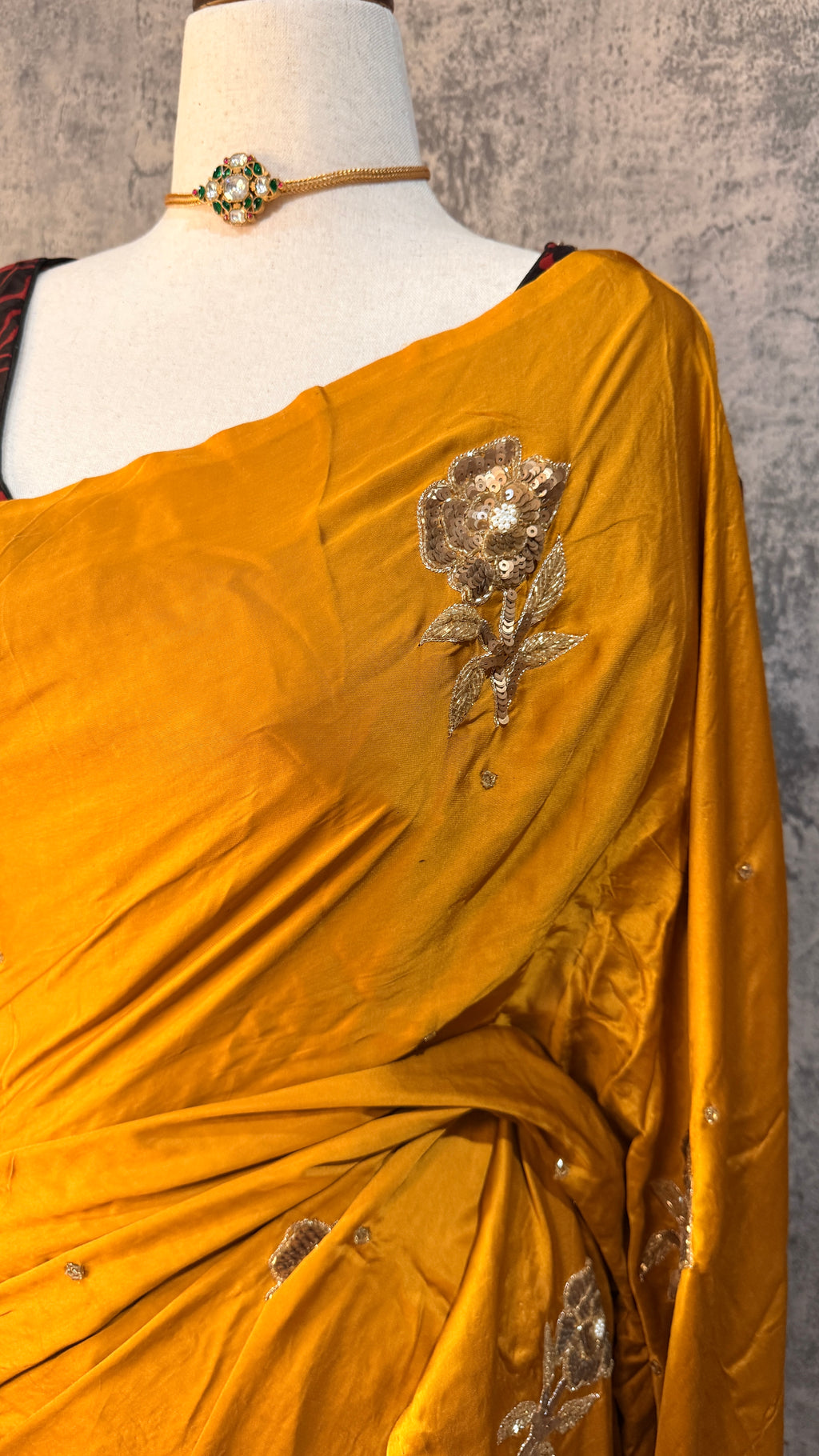 Modal silk saree with bead and mirror work , stitched blouse