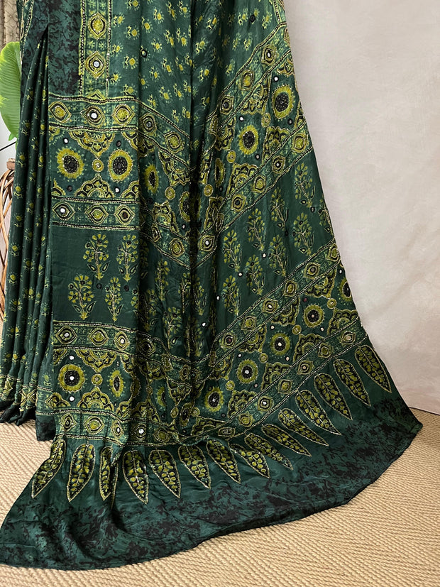 Green modal silk saree with hand work and stitched blouse