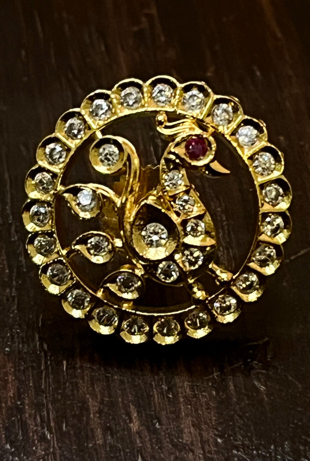 Peacock studs with white stones