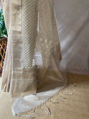 Beige Tissue Kotta silk saree with mirror and chikankari work, with stitched blouse