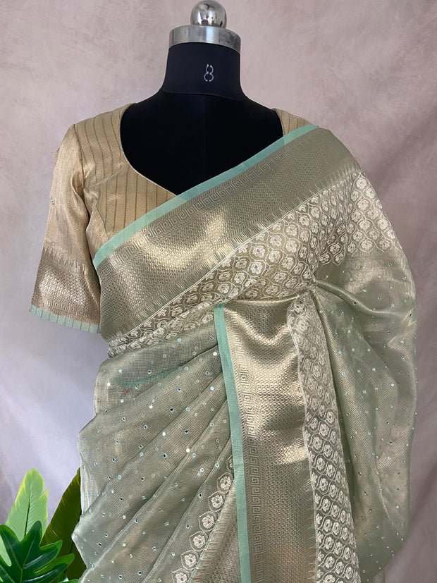 Light green Tissue Kotta silk saree with mirror and chikankari work, with stitched blouse