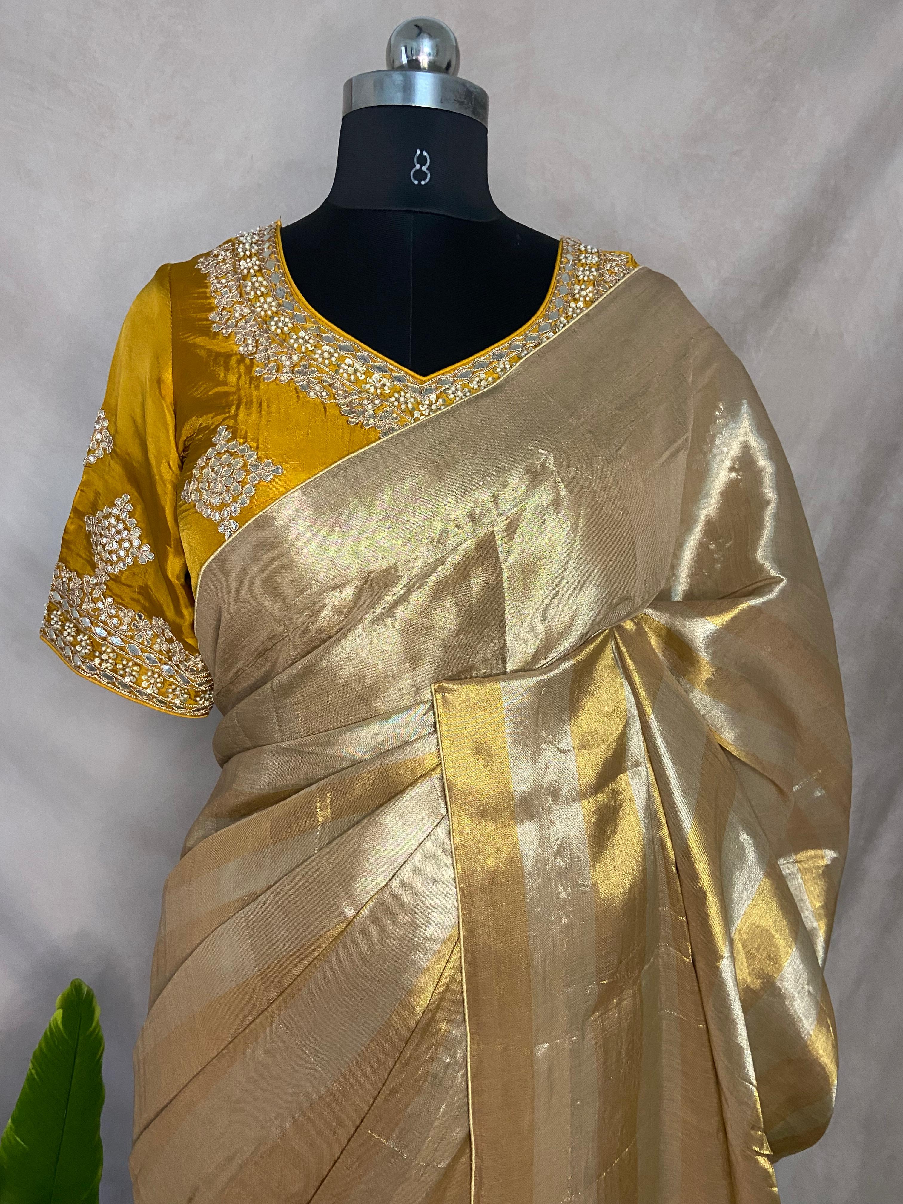Tissue silk saree with designer blouse