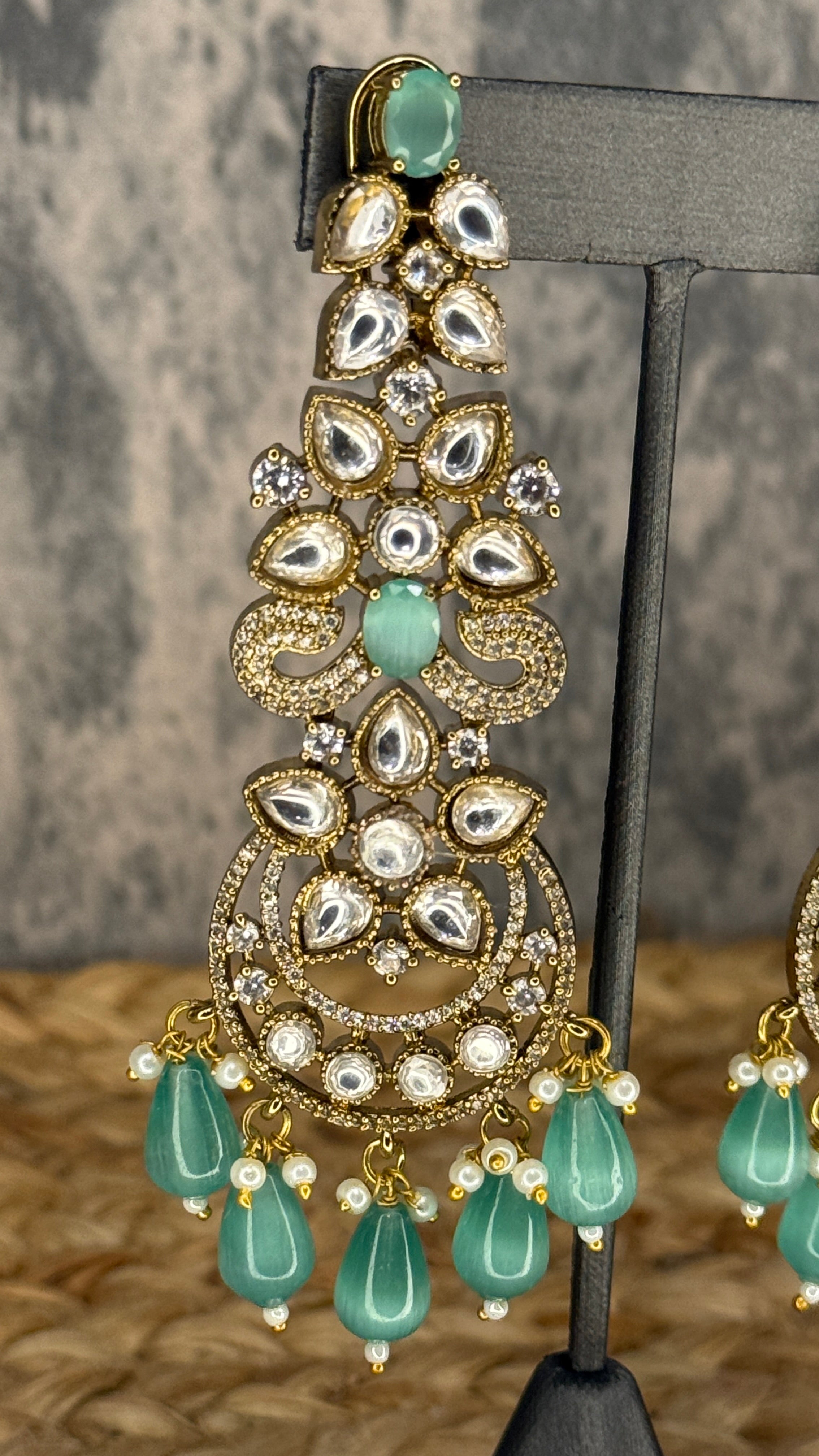 Designer replica earring with light green and moissanite stone