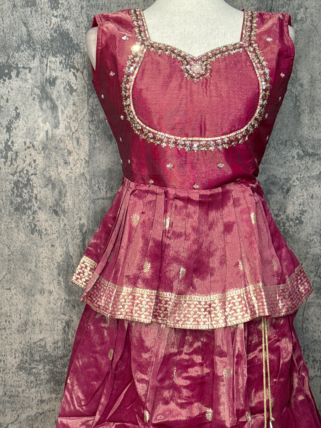 Pink tissue peplum top and banarsi skirt