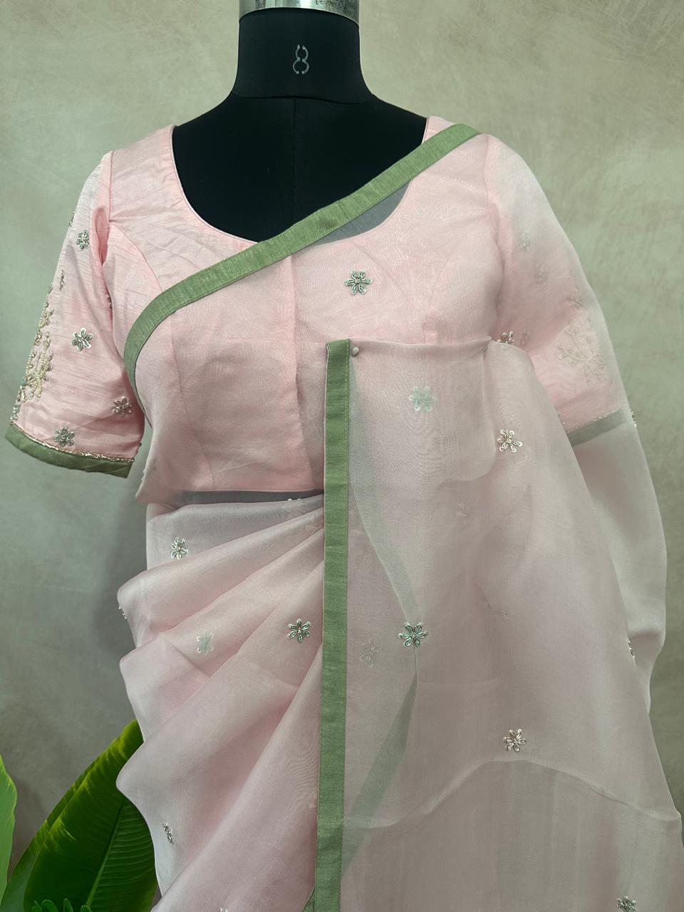 Pastel pink and green designer organza saree with stitched blouse