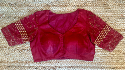 Red patch work blouse with kantha work