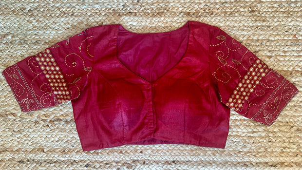 Red patch work blouse with kantha work