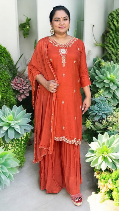 Burnt orange chanderi silk kurti with mirror work and comes gharara and dupatta