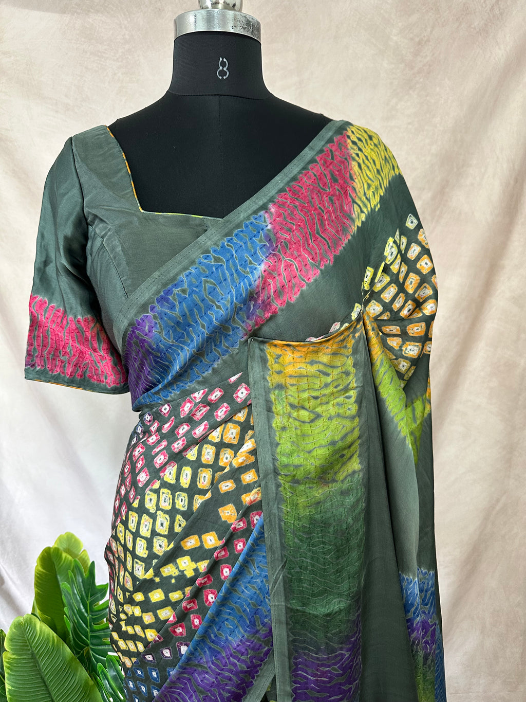 Olive green modal silk with bandhini and shibori work, stitched blouse