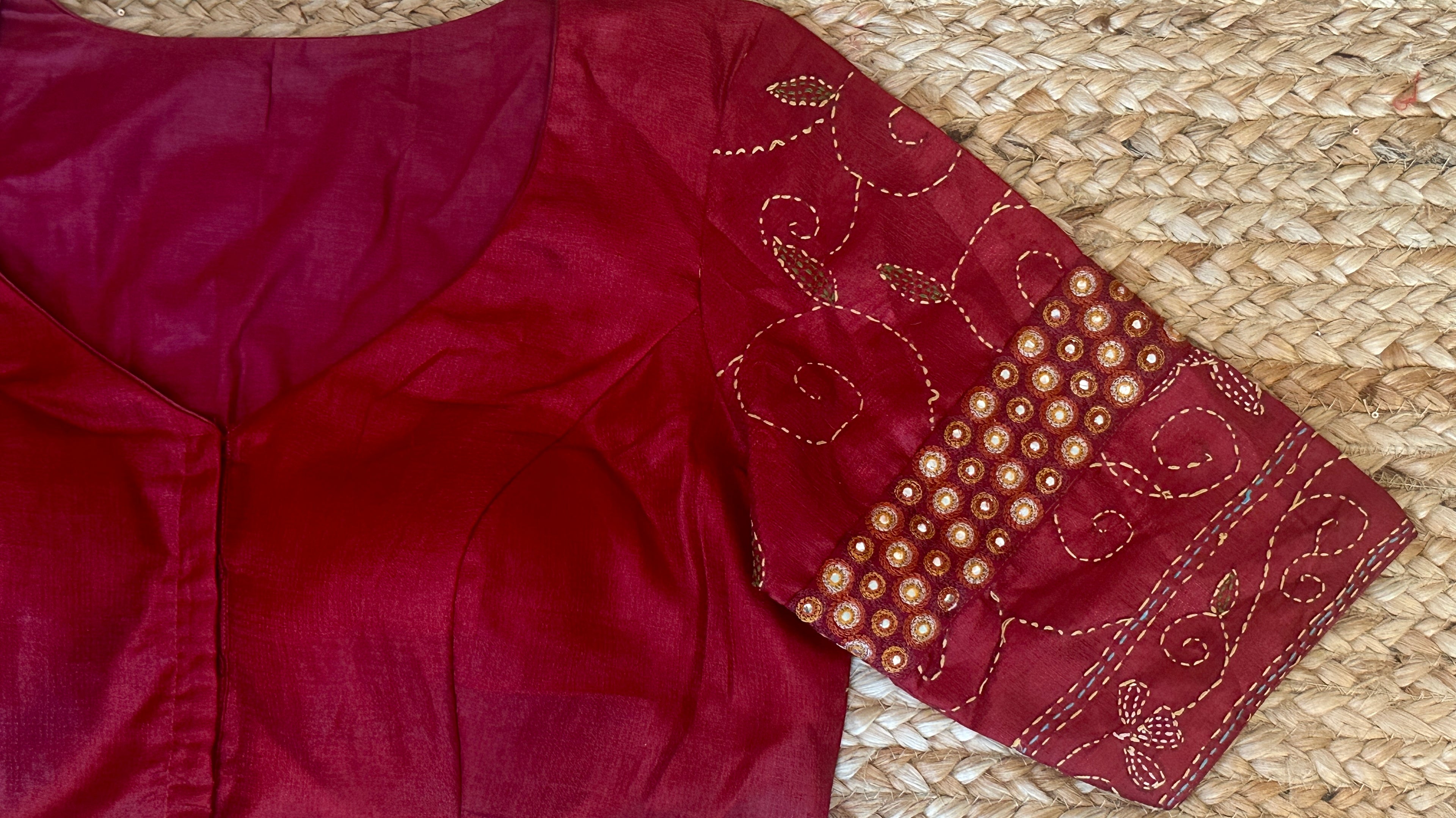 Red patch work blouse with kantha work