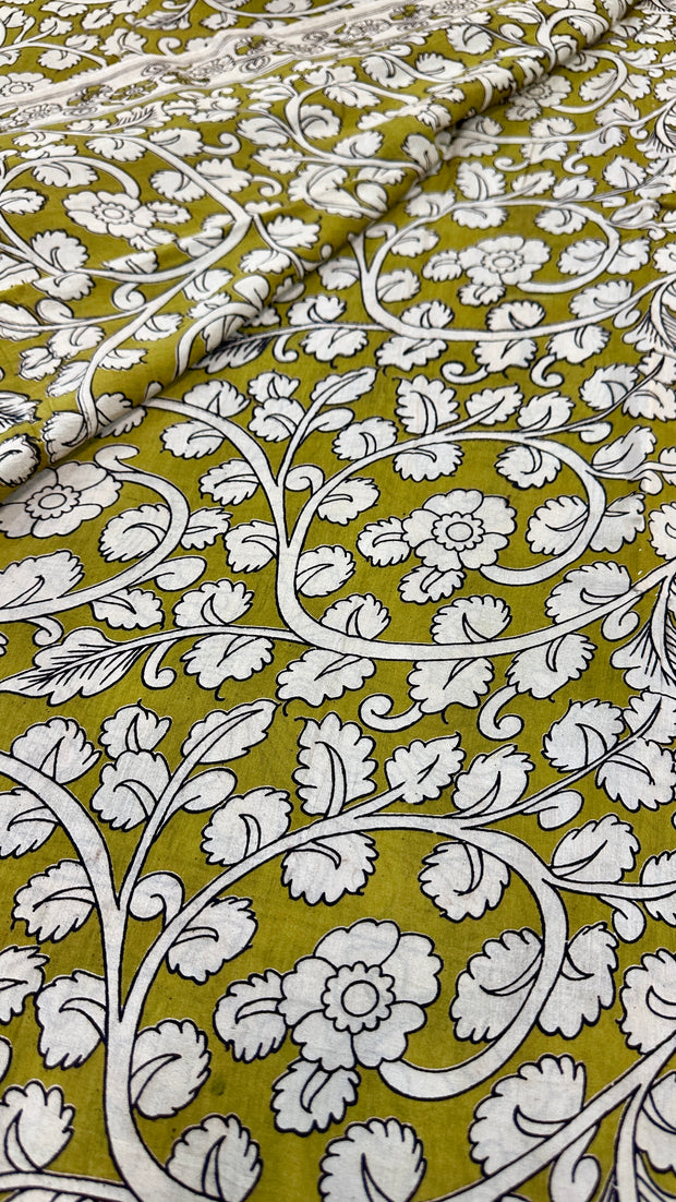 Olive green Kalamkari printed silk saree, with designer long blouse