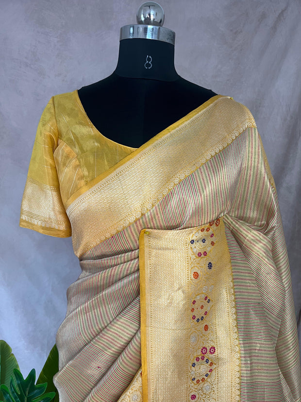 Yellow tissue organza saree with katan border with meenakari weave, stitched blouse
