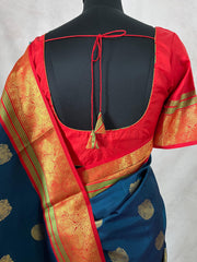 Peacock blue and red Kanchivaram saree with stitched blouse