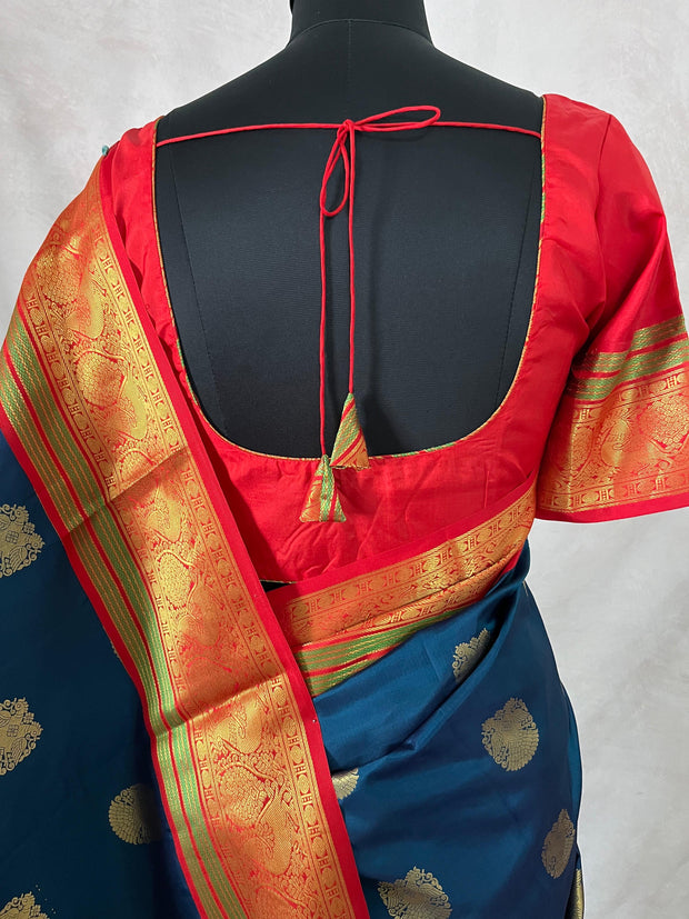 Peacock blue and red Kanchivaram saree with stitched blouse