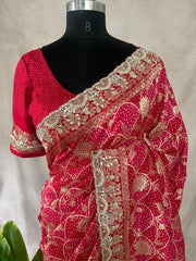 Red and pink combo designer saree with embroidery work and stitched blouse
