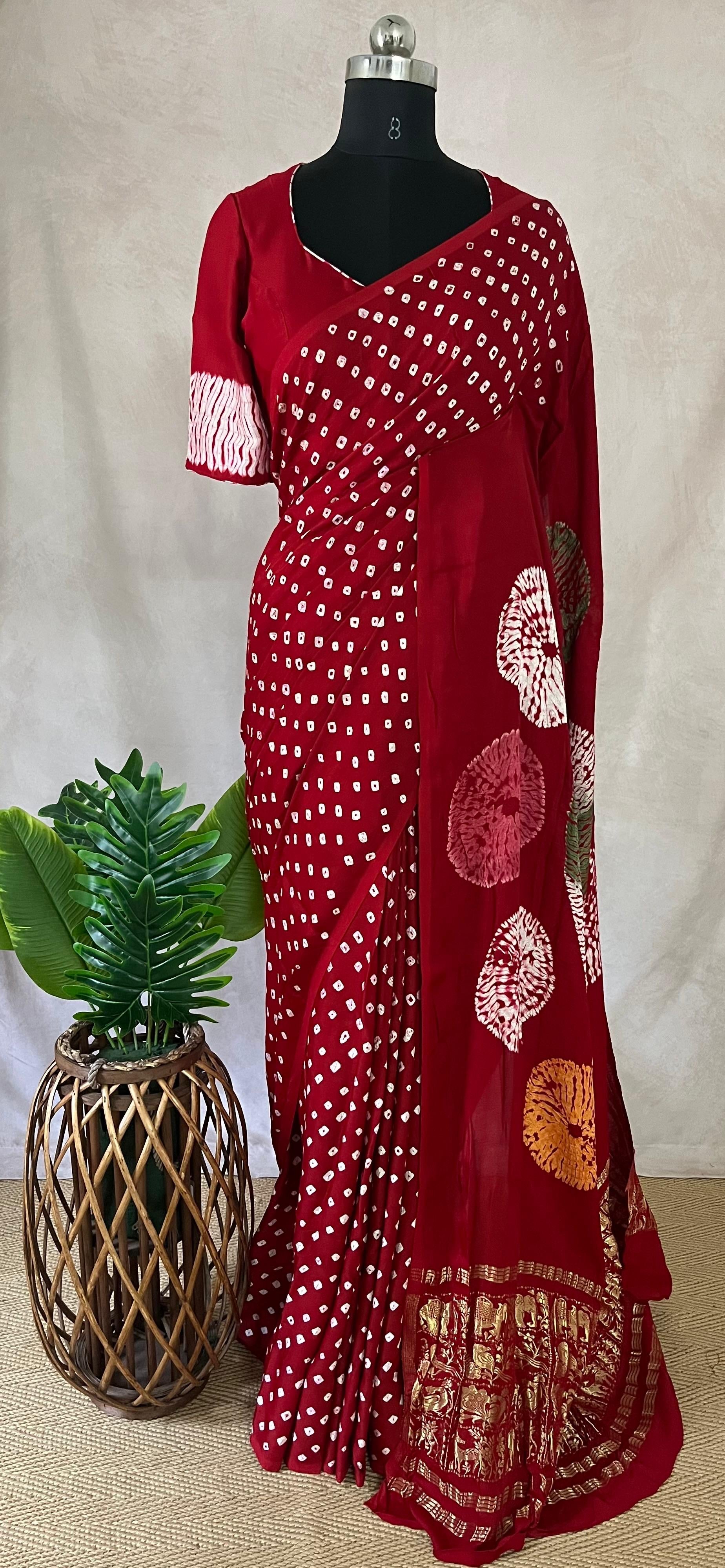 Red gajji silk saree with hand bandini and stitched blouse