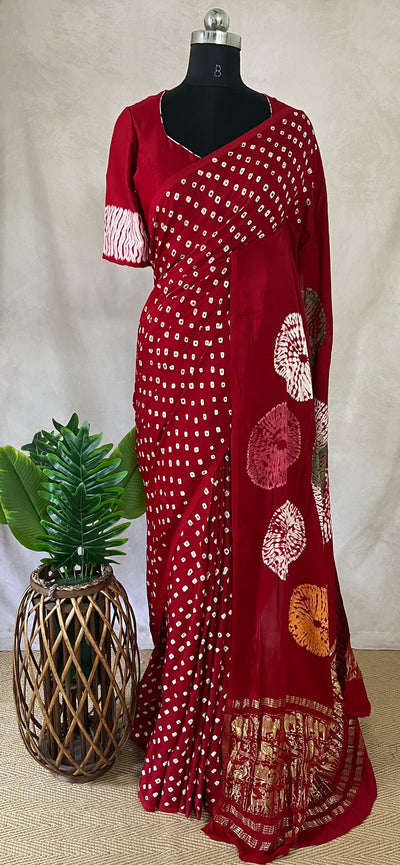 Red gajji silk saree with hand bandini and stitched blouse