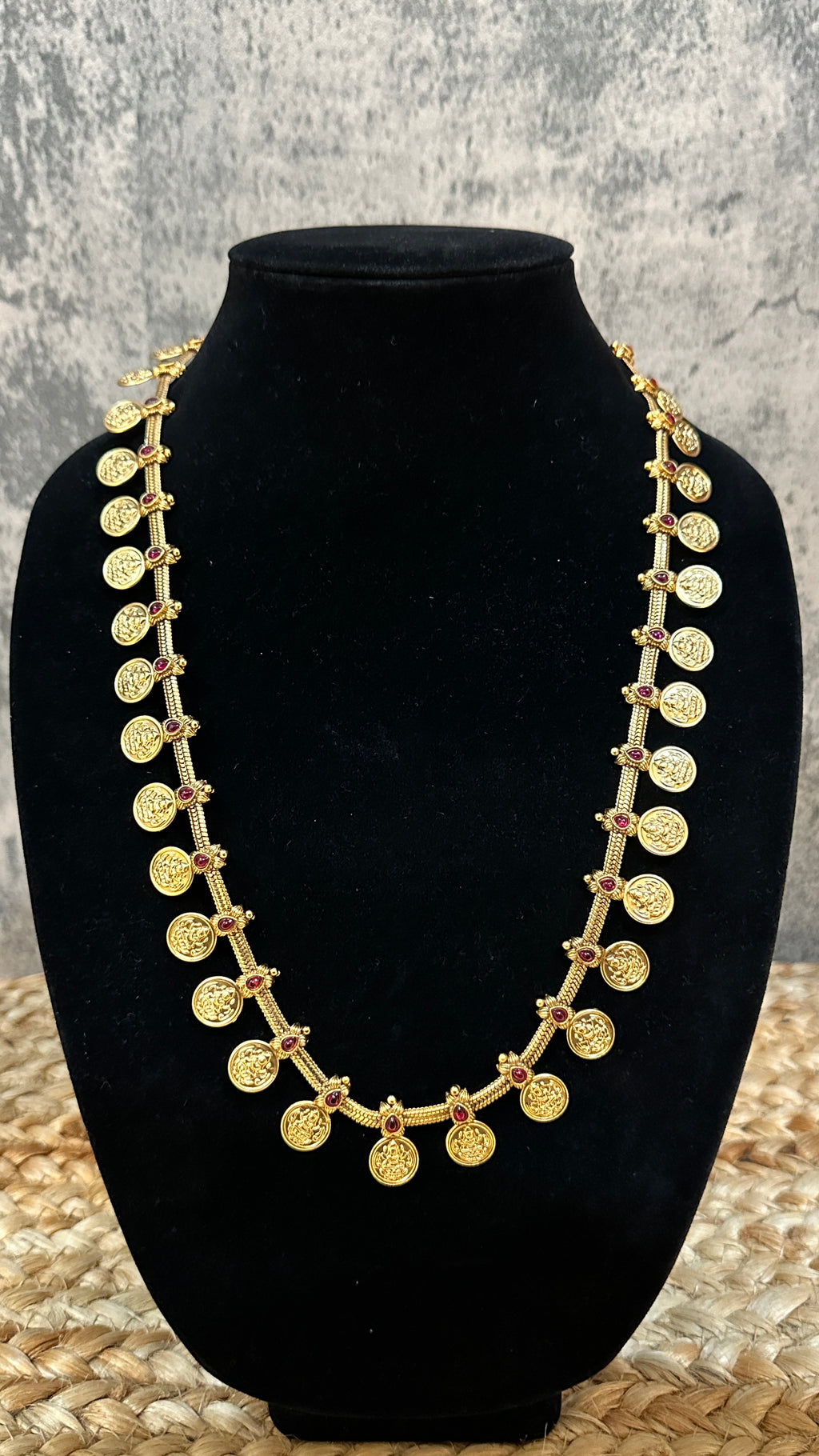Kasumala with ruby red stone