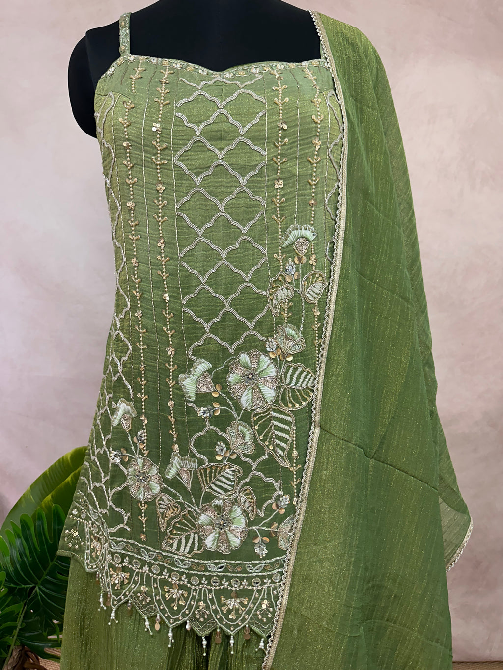 Light green deisgner short top with flared bottom
