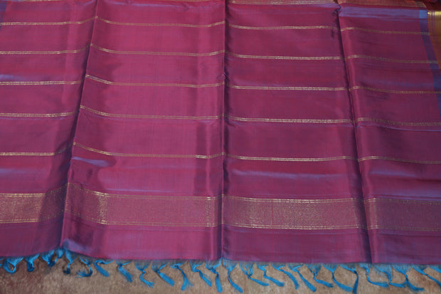 Peach and blue Combo  Kanchivaram saree with stitched blouse