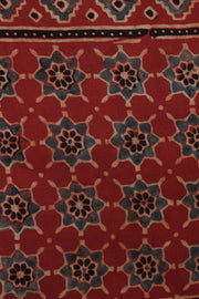 Hand block Ajrakh print Red modal silk saree with gotta patti border, with stitched blouse