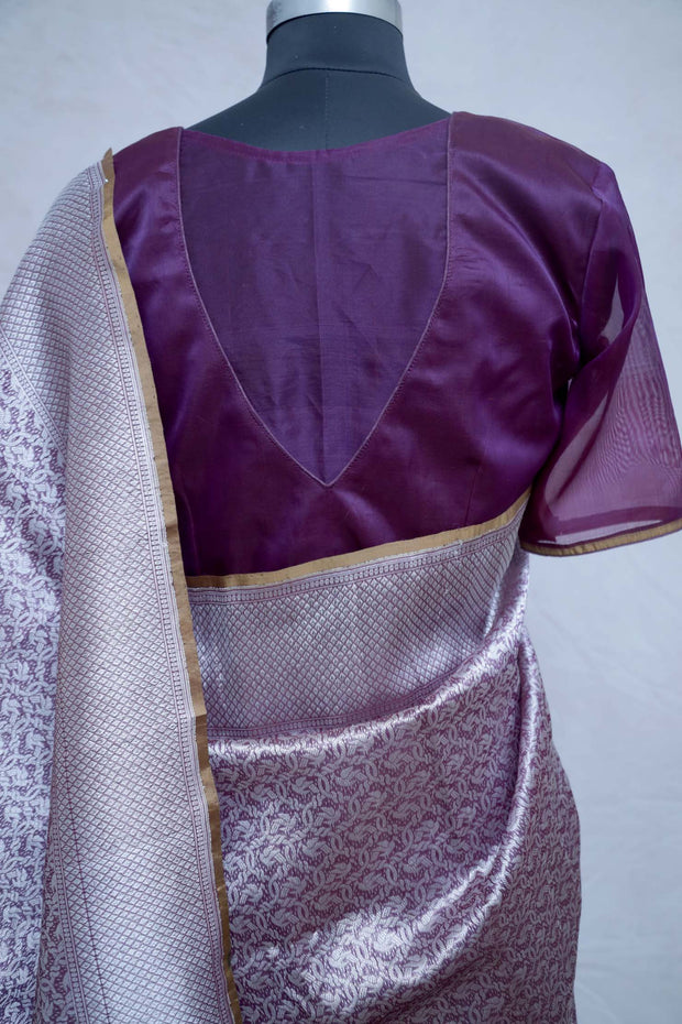 Deep burgundy brocade organza saree with stitched blouse