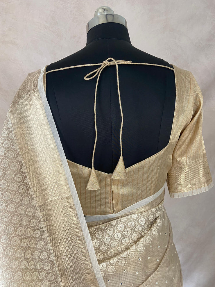 Beige Tissue Kotta silk saree with mirror and chikankari work, with stitched blouse