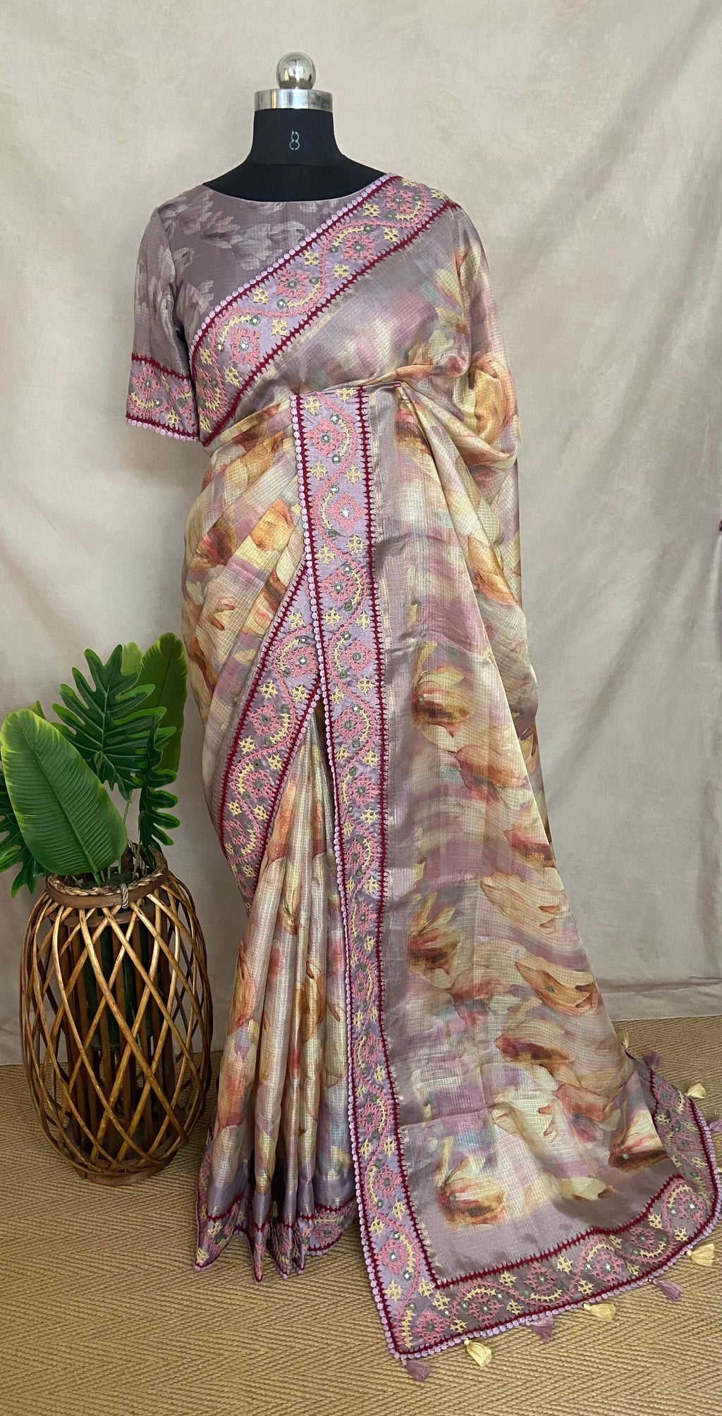 Tissue kotta saree with kutch work border and stitched blouse