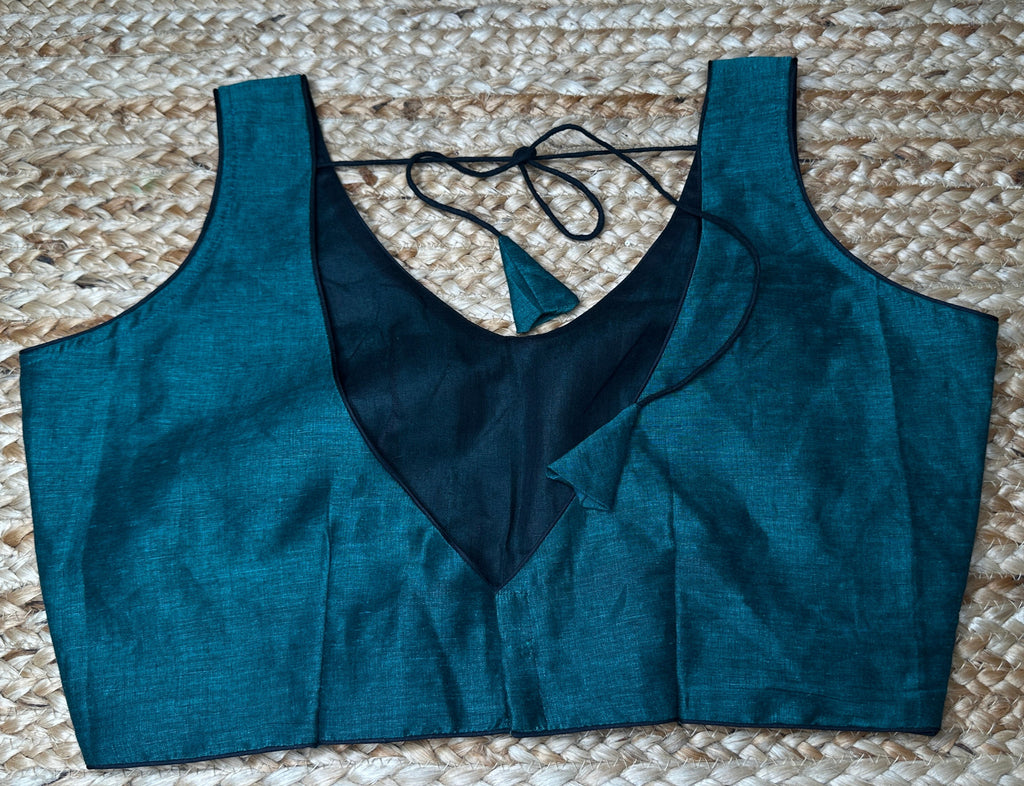 Green cotton sleeveless blouse
