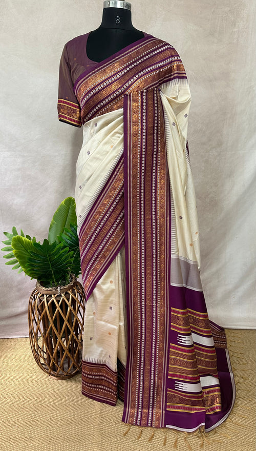 Asam silk saree with Purple broder and stitched blouse